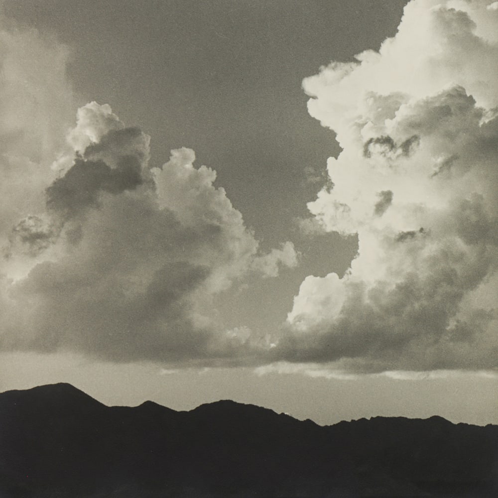 Photograph, Dorothea Lange: Dorothea Lange (American, 1895-1965), "Clouds, Utah," gelatin silver print, unsigned, sheet: 11.25"h x 11"w, overall (with backing, unframed): 11.5"h x 11"w. Provenance: Provenance: Collection of