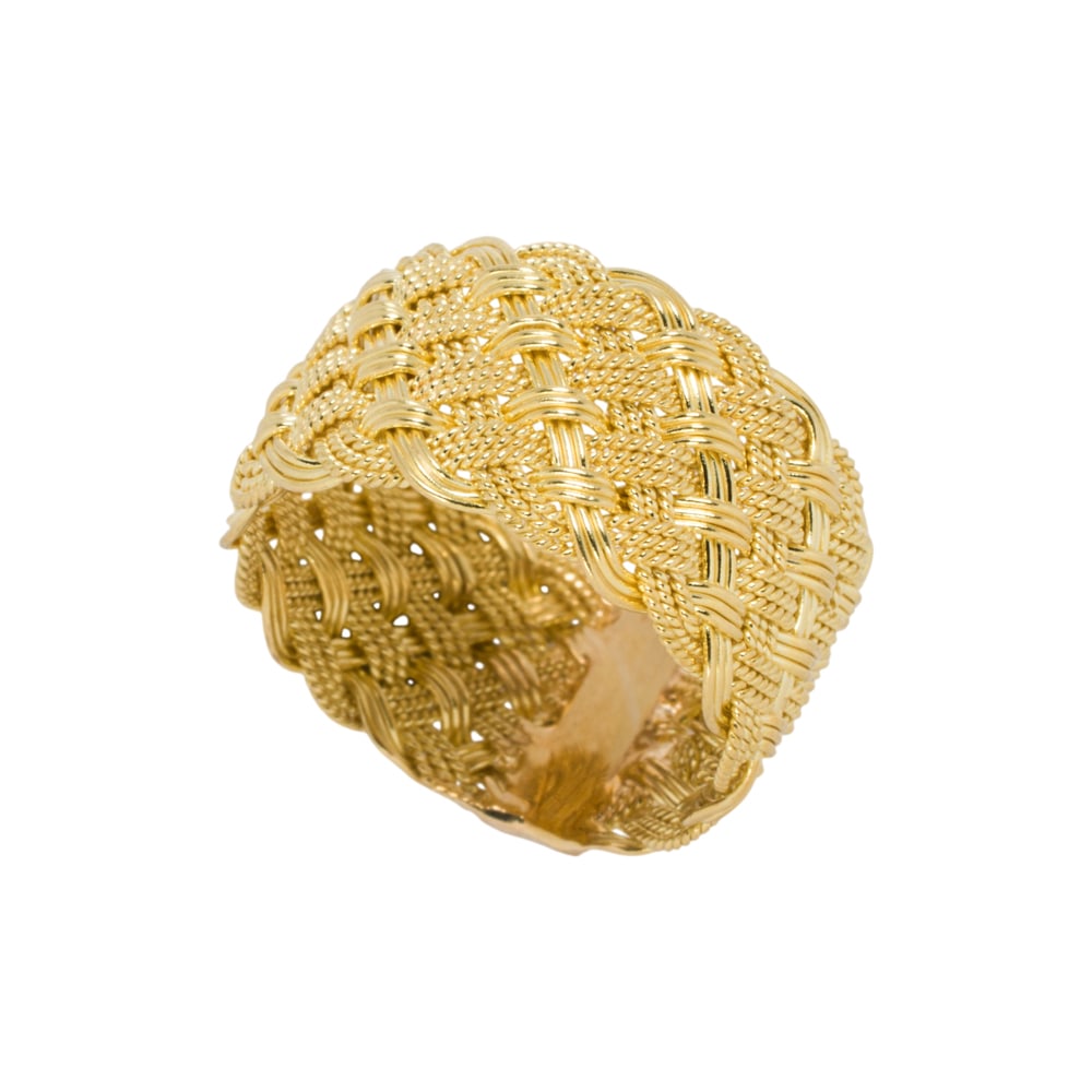 An 18k gold ring: An 18k gold ring Of woven design; size 6 1/2; 5.45 grams