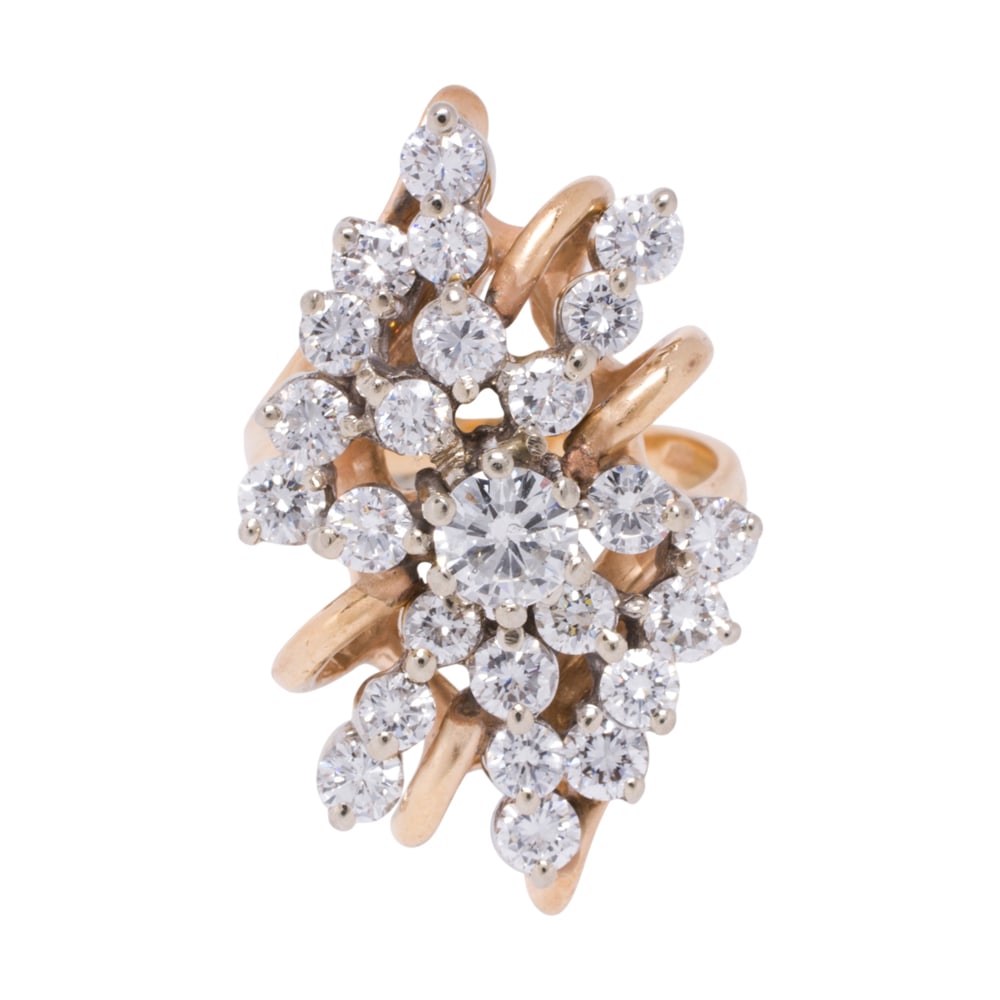 A diamond and 14k gold ring: A diamond and 14k gold ring of freeform cluster design centering a round brilliant-cut diamond weighing approximately: 0.45 carat, accented by an addition 26 round brilliant-cut diamonds; estimated to