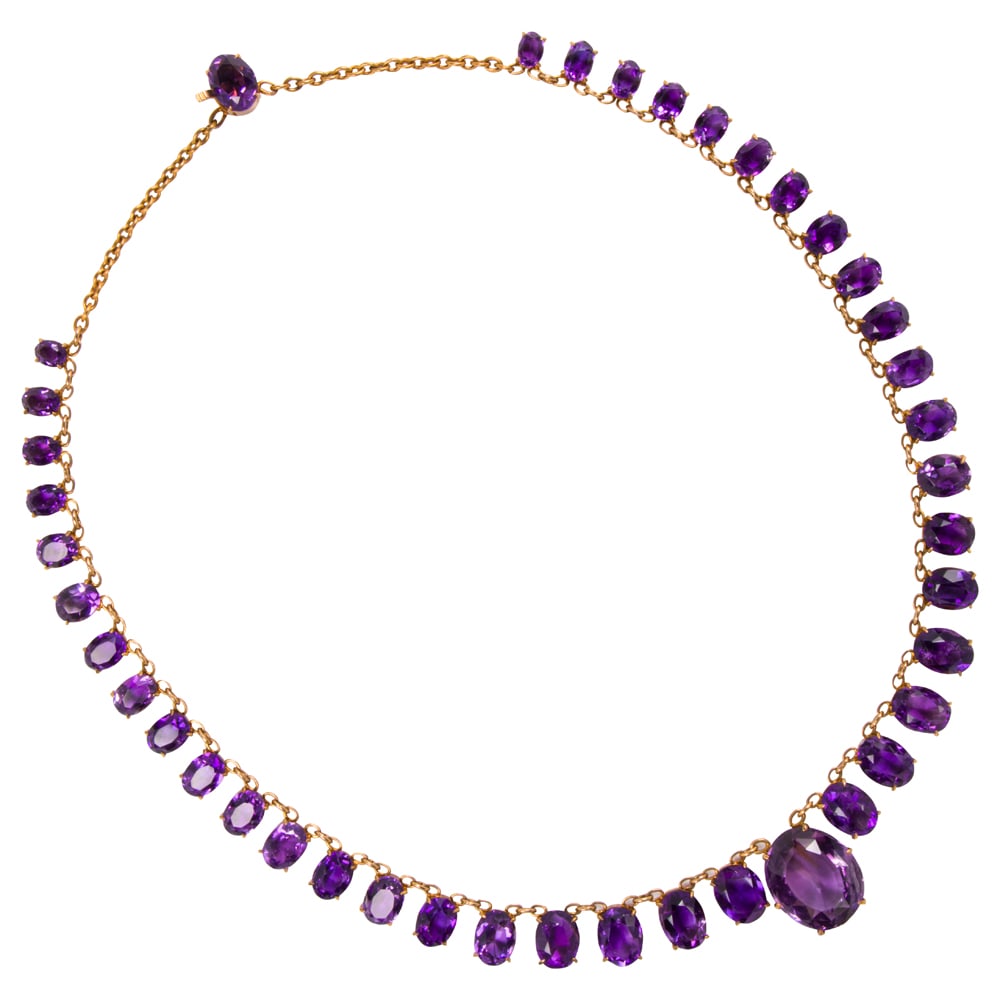 An antique amethyst and 10k gold necklace: An antique amethyst and 10k gold necklace the fringe necklace set with 41 oval-shaped amethysts graduating from approximately 16.65 x 13.92 x 7.30 to 5.22 x 4.22 x 2.82 mm; length: 16 in; 23.40 grams