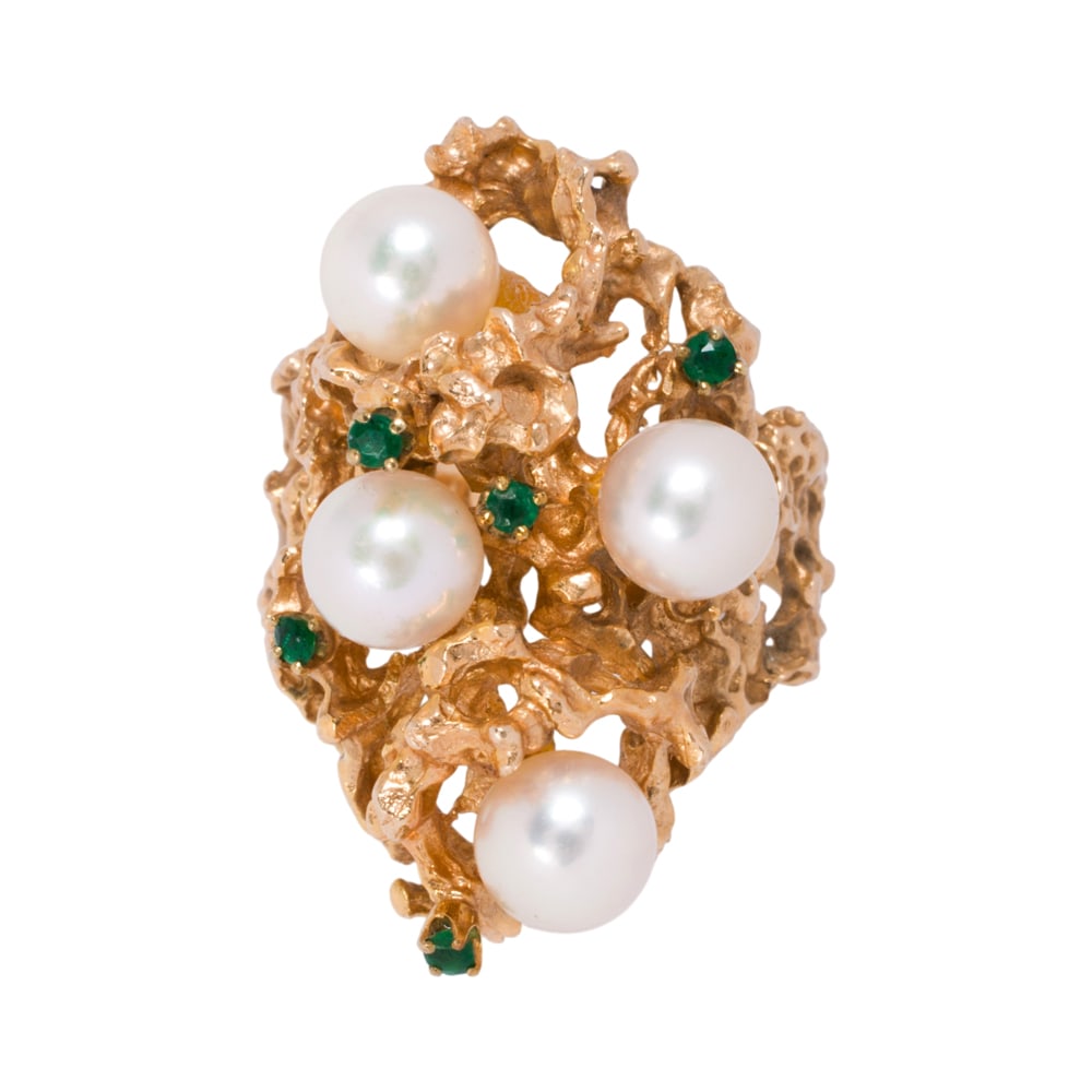 A pearl, emerald and 14k gold ring: A pearl, emerald and 14k gold ring of abstract open form design, featuring four cultured pearls accented by circular-cut emeralds; size: 7 1/2 in; 11.60 grams