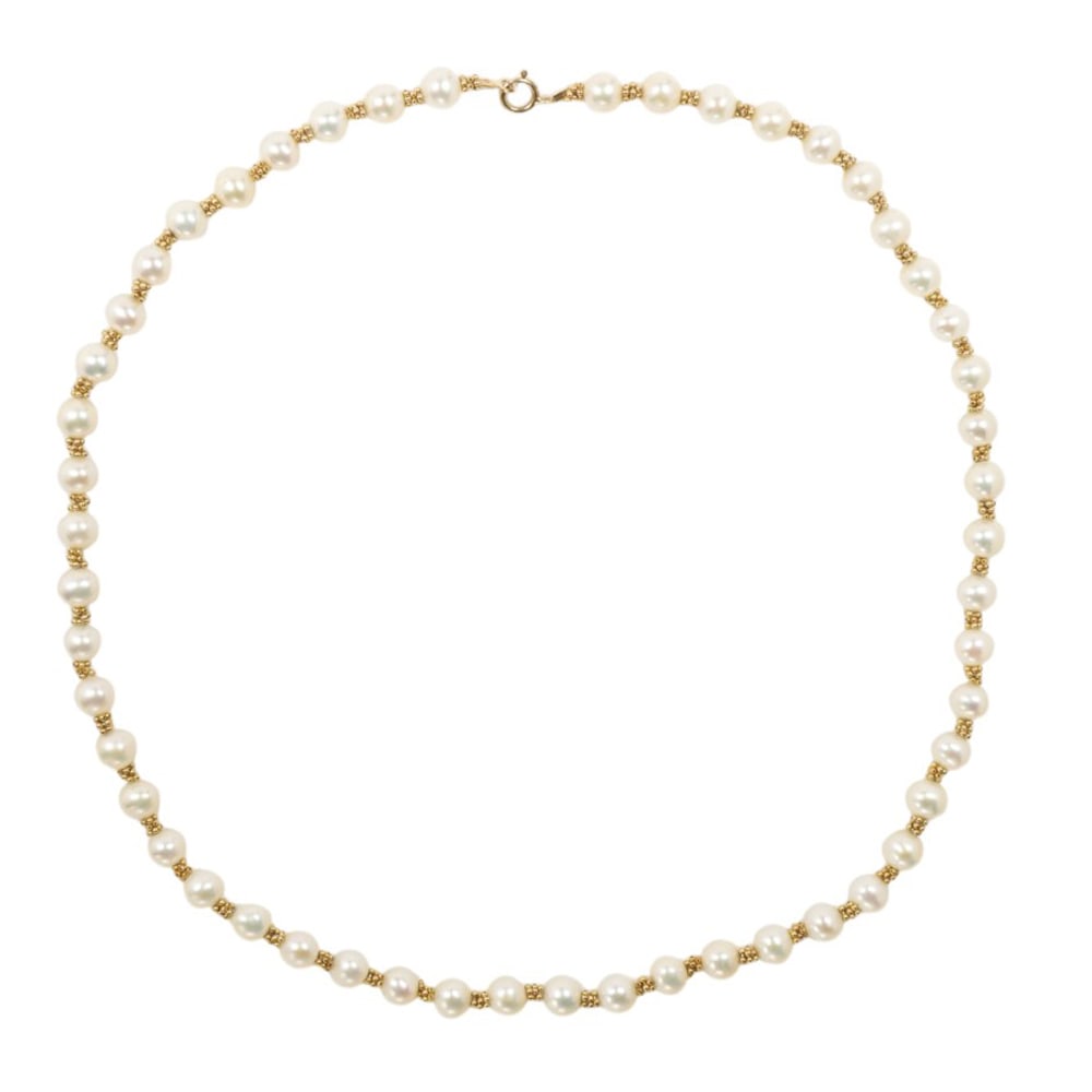 A cultured pearl and 14k gold necklace: A cultured pearl and 14k gold necklace Composed of cultured pearls measuring approximately 5.85 to 5.45 mm, interspersed by gold bead clusters; length: 16 3/4in; 16.60 grams