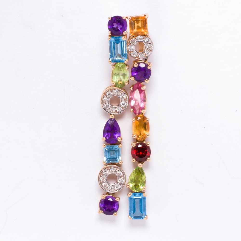 A diamond, gemstone and 14k gold pendant: A diamond, gemstone and 14k gold pendant designed as two lines of topaz, amethyst, rose quartz, citrine, peridot and garnet, accented by discs of round brilliant-cut diamonds; 6.3 grams; length: 2 in