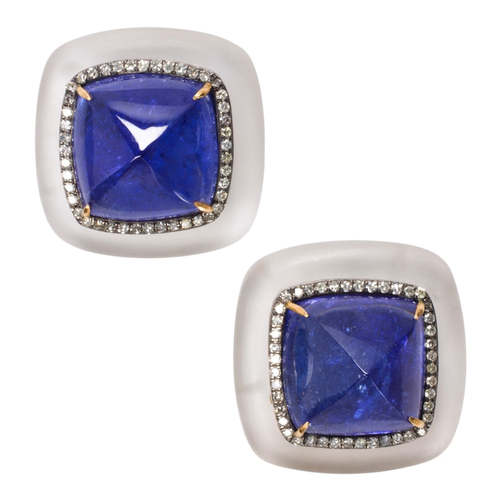 A tanzanite, rock crystal, diamond, silver, and 14k gold pair of earrings: A tanzanite, rock crystal, diamond, silver, and 14k gold pair of earrings The silver earrings centering sugarloaf shaped tanzanite cabochons measuring 12.45 x 12.97 mm, with round-cut diamond and