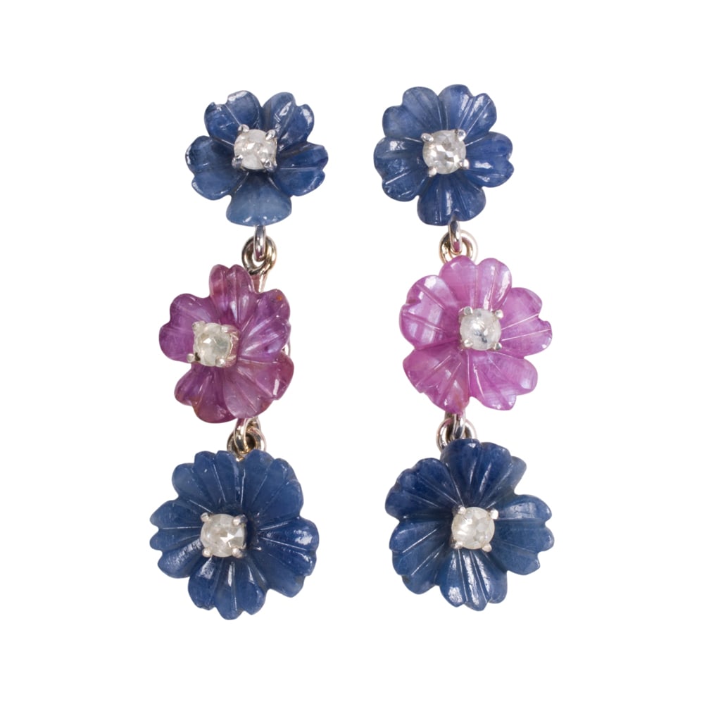 A pair of sapphire, diamond, silver, and 14k gold earrings: A pair of sapphire, diamond, silver, and 14k gold earrings The silver earrings featuring floriform sapphire carvings accented by round-cut diamonds, with 14k gold prongs and earring backs; total