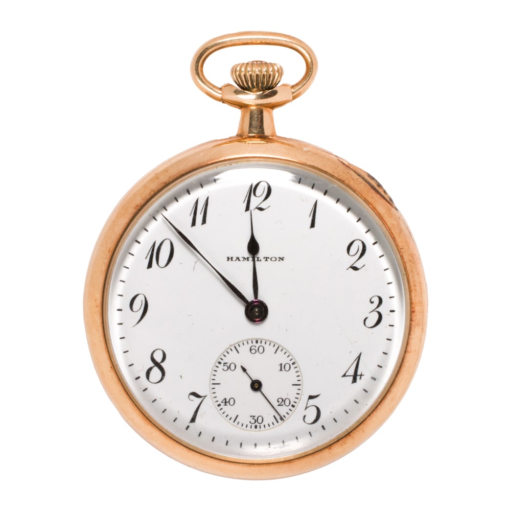 A Hamilton 14k gold pocket watch: A Hamilton 14k gold pocket watch Case no.: 6830993The white-tone face, black Arabic indices, black breguet hands, subsidiary dial, within polished 14k gold case, containing a 23 jewel manual movement 
