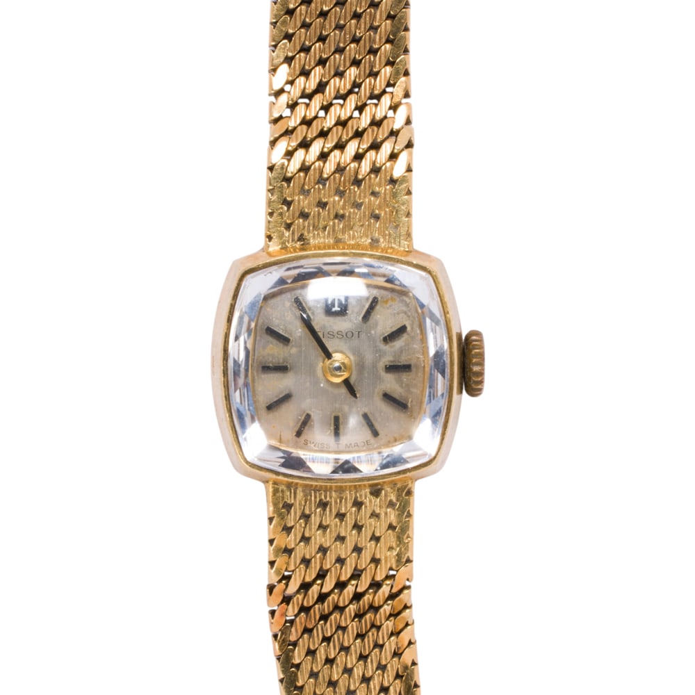 An 18k gold tissot watch (1 of 2)