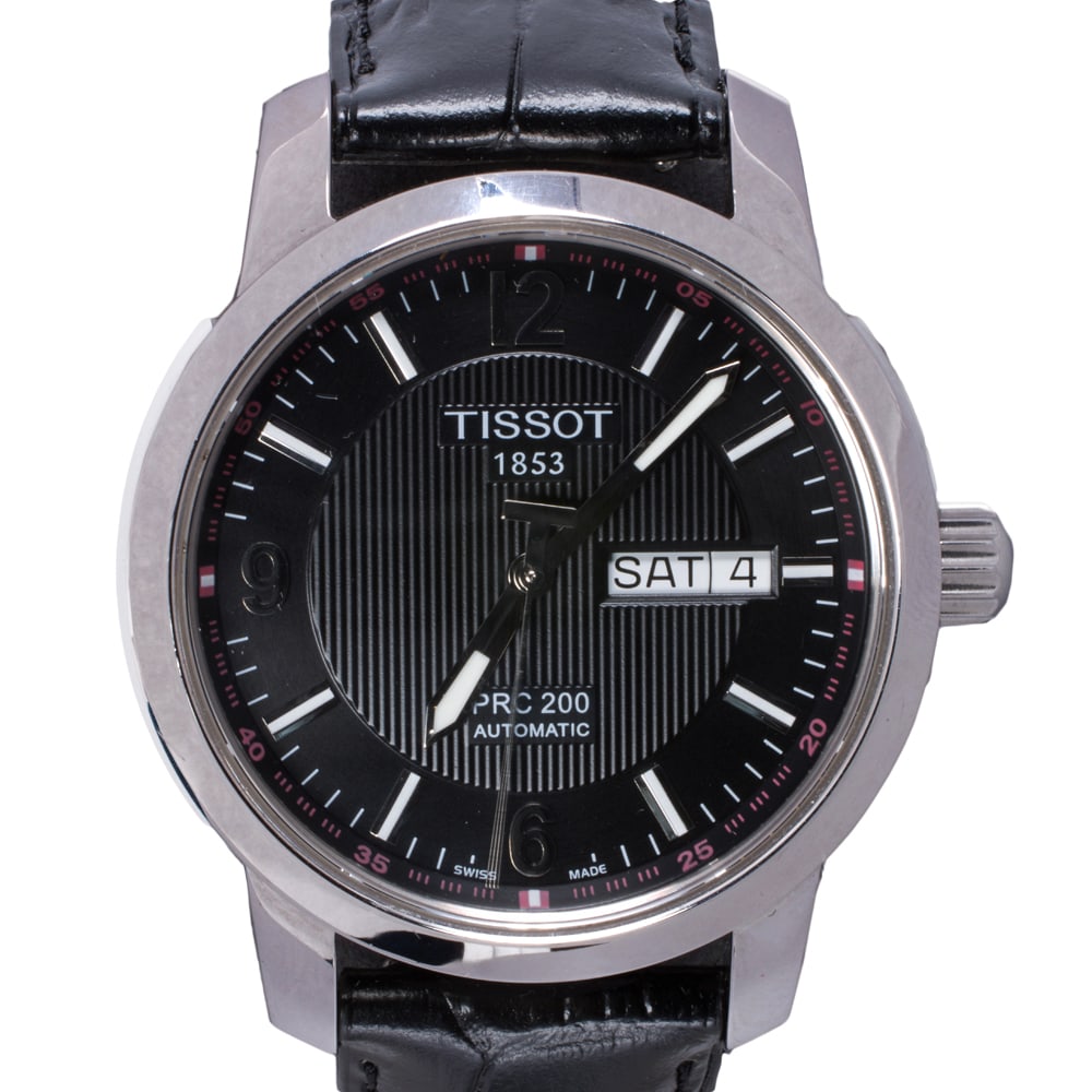 A Tissot wristwatch: A Tissot wristwatch The black face, luminous mixed indices, luminous sword hands, date aperture, within stainless steel case, containing a 25 jewels manual movement, on black leather strap; case width