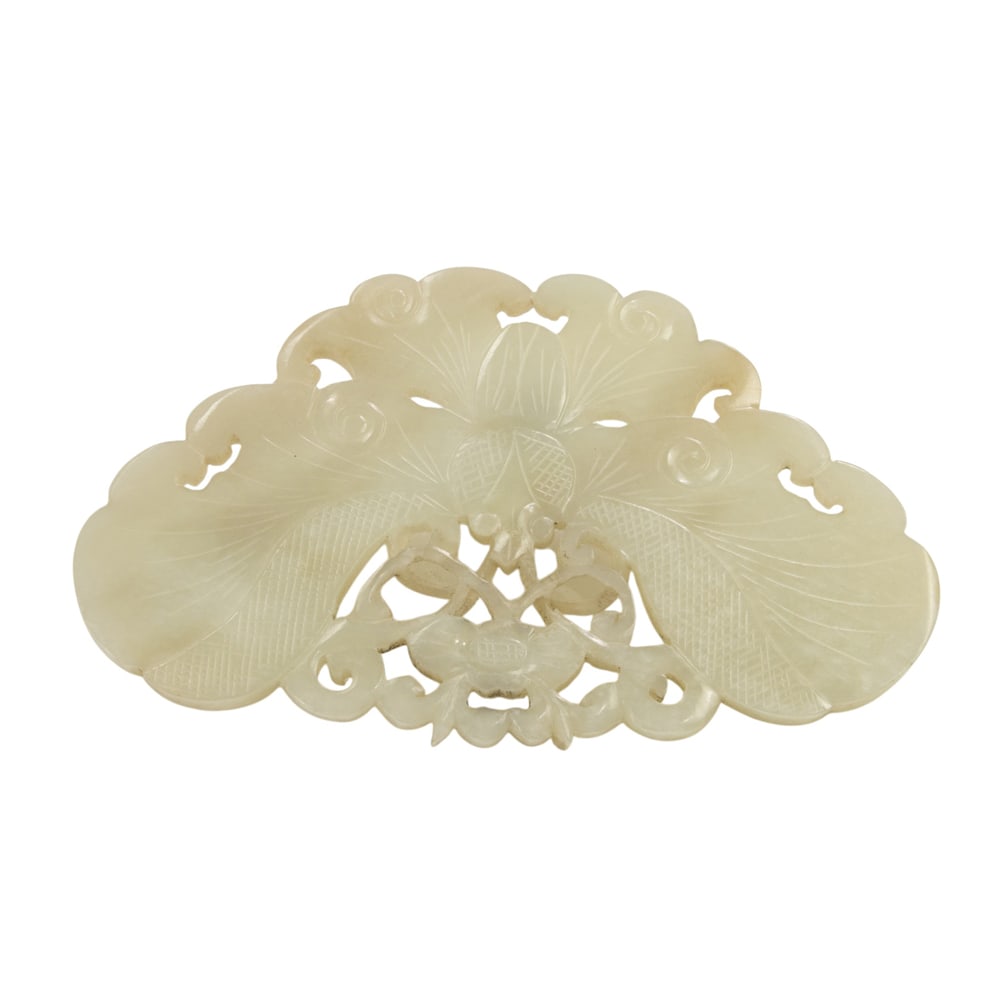 A Chinese celadon jade 'butterfly' plaque (1 of 3)