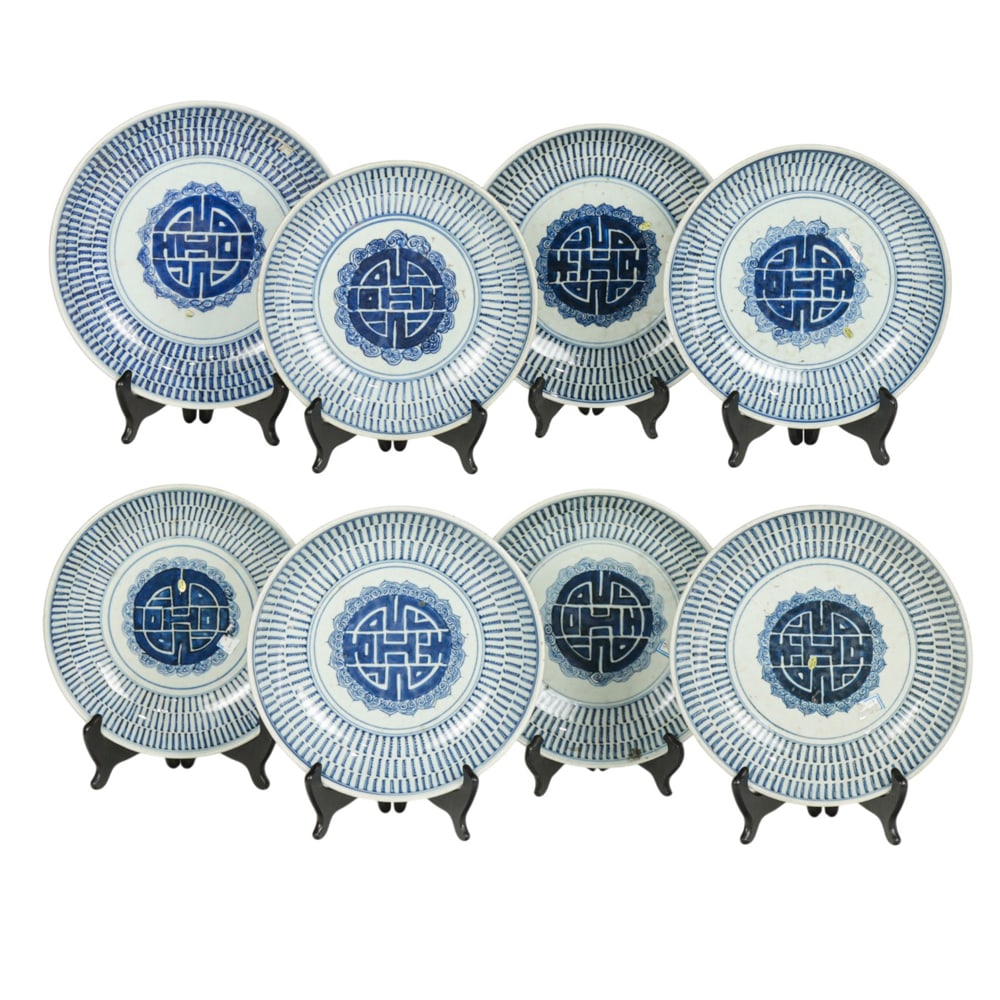 (lot of 8) Chinese blue and white longevity dishes: (lot of 8) Chinese blue and white longevity dishes. Featuring medallion of Shou character in the center, late Qing period, from 10.125" to 11.25" across.