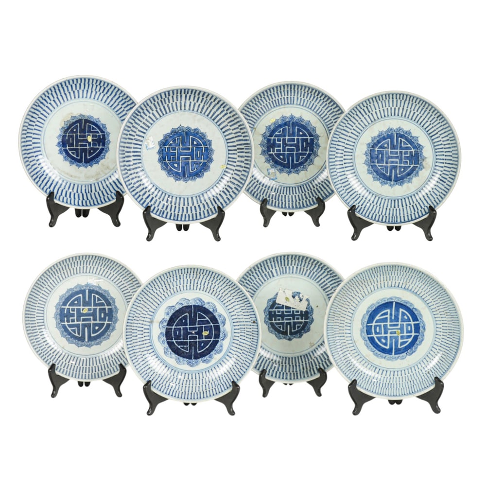 (lot of 8) Chinese blue and white longevity dishes: (lot of 8) Chinese blue and white longevity dishes. Featuring medallion of Shou character in the center, late Qing period, from 10.25" to 10.75" across.