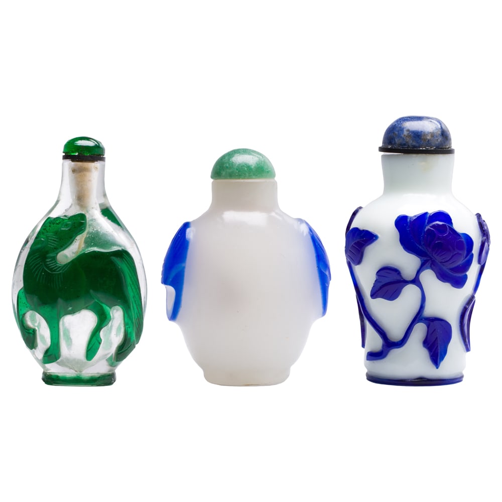 (lot of 3) Chinese overlay glass snuff bottles: (lot of 3) Chinese overlay glass snuff bottles. Featuring horse and figural motif, late 19th/early 20th century, from 2.625" to 3" high.