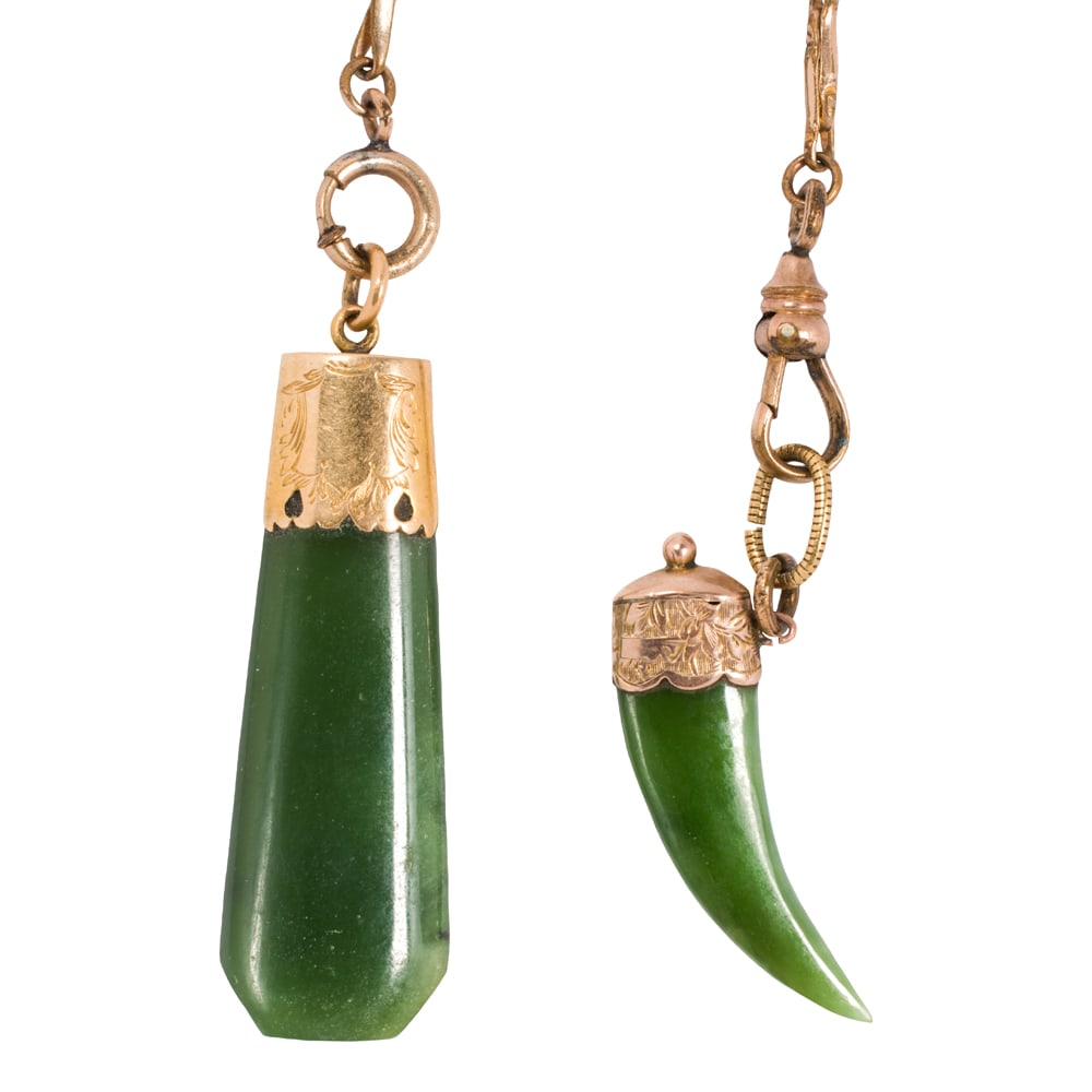 An antique jade, 9k gold, and gold-filled pocket watch chain and fobs: An antique jade, 9k gold, and gold-filled pocket watch chain and fobs Featuring two jade fobs set in 9k gold, on fancy link gold-filled chain; chain length: 18 in; 16.35 grams