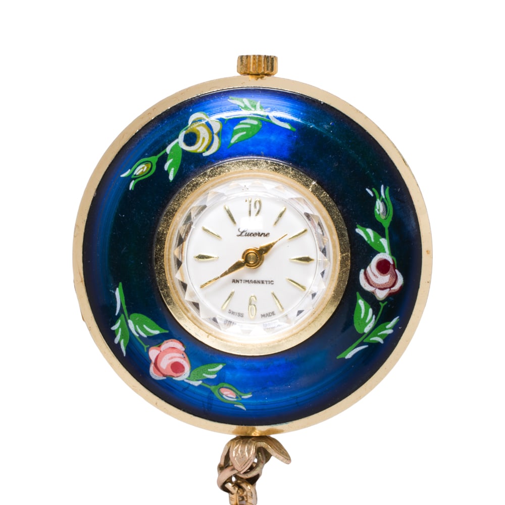 An enamel watch pendant necklace: An enamel watch pendant necklace Featuring floriform enameling; watch length: 1 5/8 in; chain length: 25 in; 25.55 grams