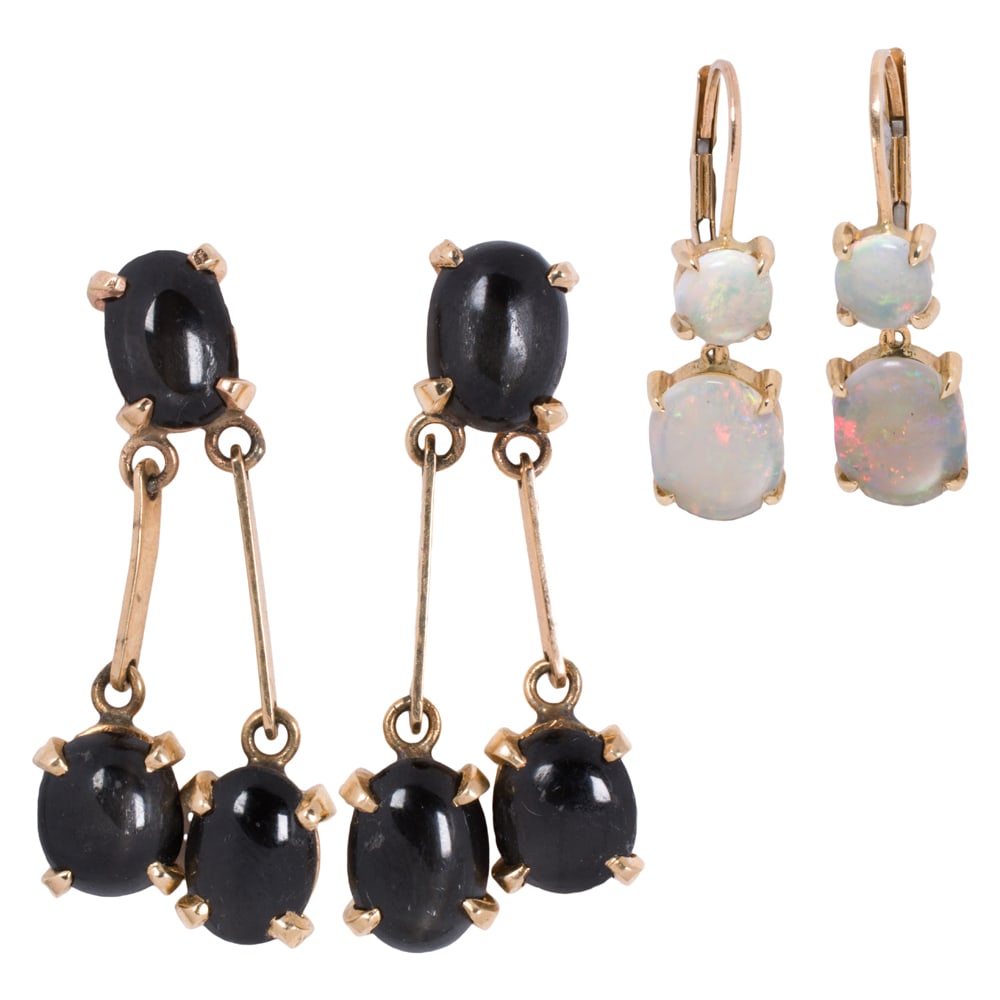 Two pairs of gem-set and 14k gold earrings: Two pairs of gem-set and 14k gold earrings Comprising one pair set with two oval-shaped opal cabochons, together with one set with three oval-shaped black star sapphire cabochons; lengths: 1 and 1
