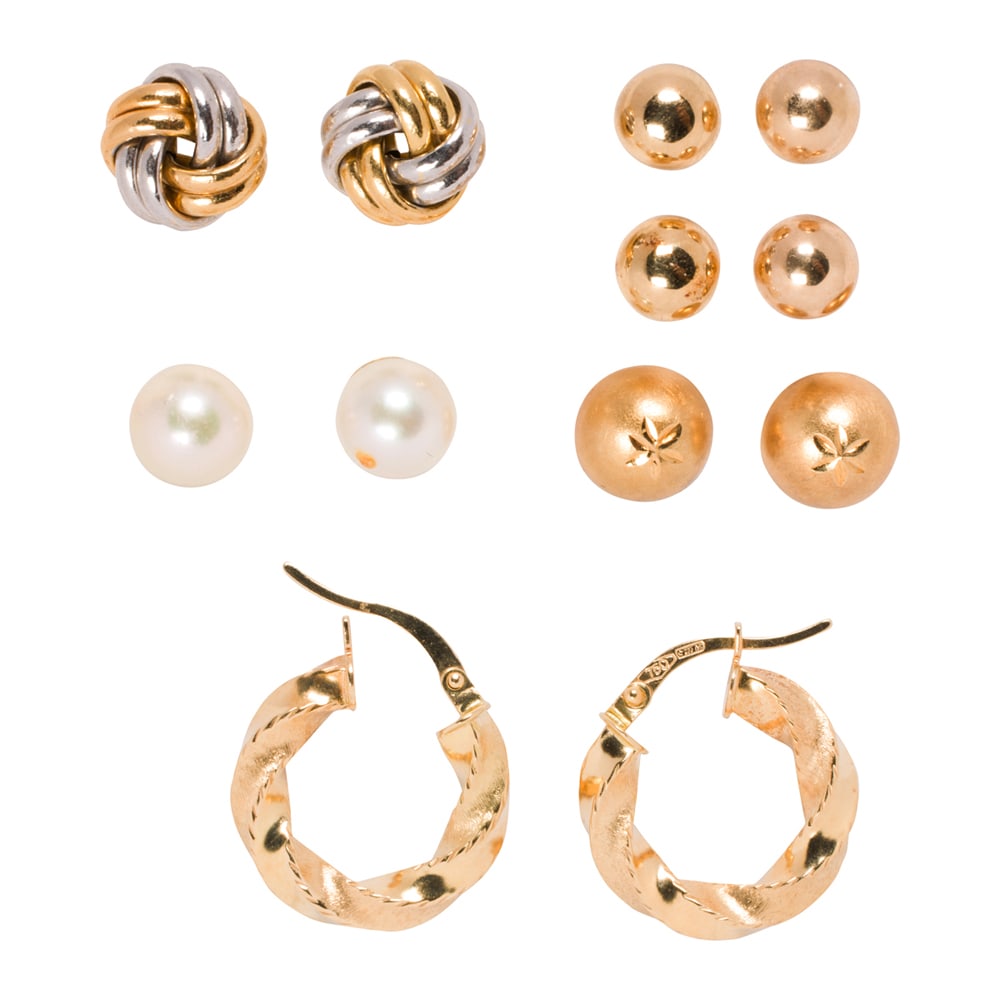 Six pairs of 14k and 18k gold earrings: Six pairs of 14k and 18k gold earrings including hoops and stud designs, and one pair of cultured pearls; gross weight: 5.20 grams