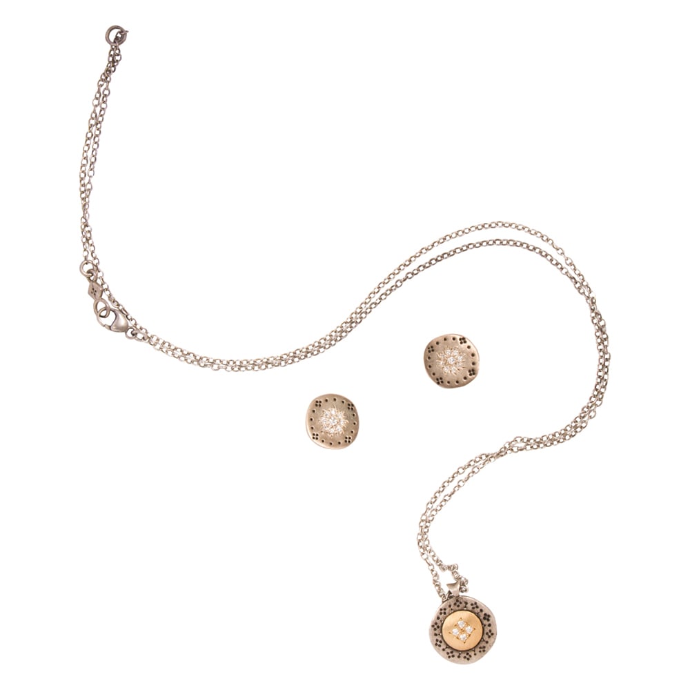An Adel Chefridi diamond, sterling silver, and 18k gold pendant necklace and earrings: An Adel Chefridi diamond, sterling silver, and 18k gold pendant necklace and earrings The necklace in the "Four Star Harmony" design, set with four round brilliant-cut diamonds within circular 18k gol