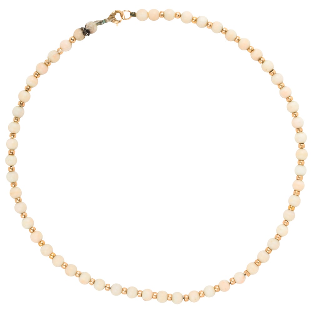 A coral and 14k gold necklace: A coral and 14k gold necklace Designed with coral beads measuring approximately 5.42 mm, interspersed by 14k gold beads measuring 3.16 mm; length: 14 1/2 in; 13.95 grams