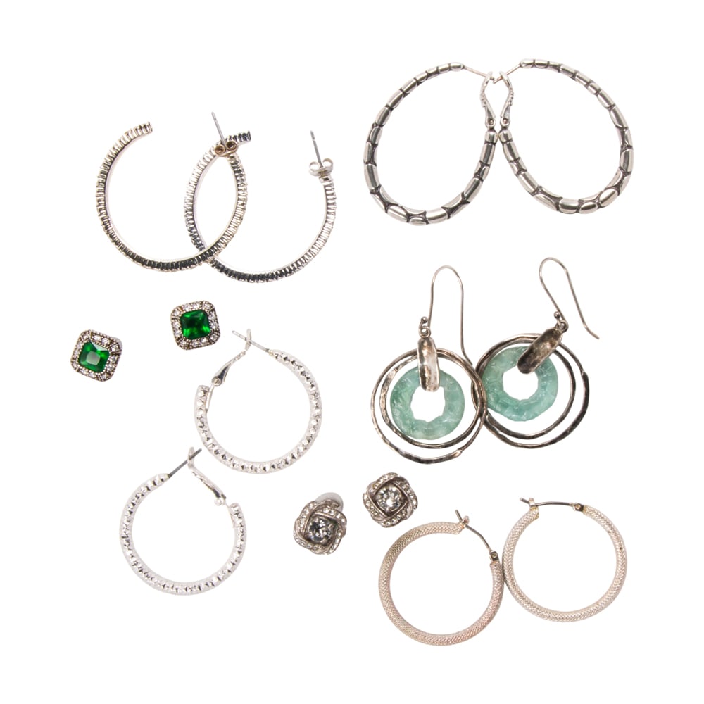 Fourteen pairs of silver earrings (1 of 1)
