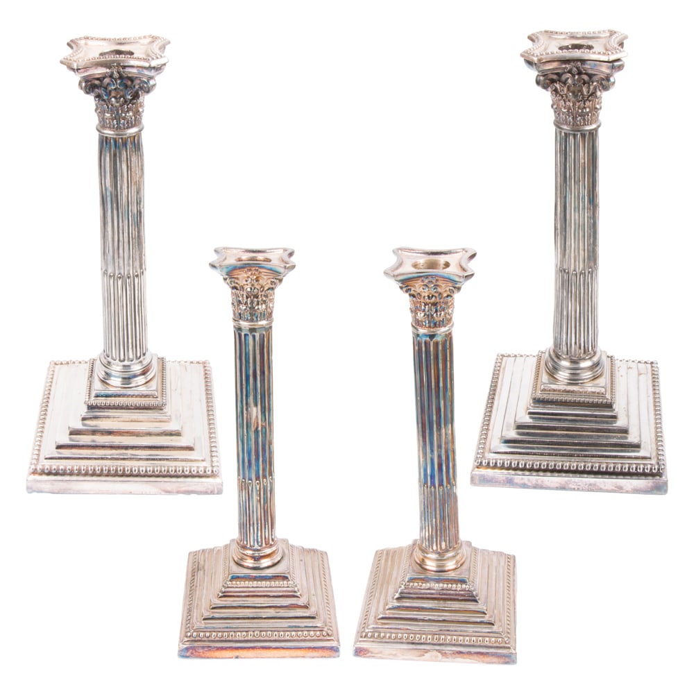 Two pairs of silver plated Corinthian order candlesticks: Two pairs of silver plated Corinthian order candlesticks, the first pair by Meriden Britannia Company, 12.5"h; the second pair by Fenton Bros., Sheffield, 11.5"h