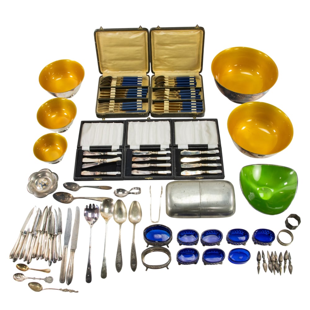 A group of plated items: A group of plated items: set of 5 graduated bowls and a similar tripod bowl by Reed & Barton; a petal edge taper holder by Dansk; a large English flask retailed by Abercrombie & Fitch; set 12 butter