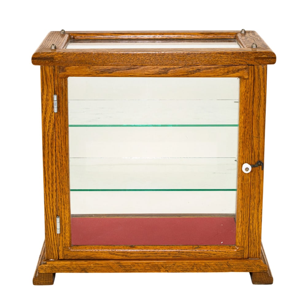 An oak framed display cabinet with glass walls and shelves: An oak framed display cabinet with glass walls and shelves, 14.5"h x 14"w x 9.5"w