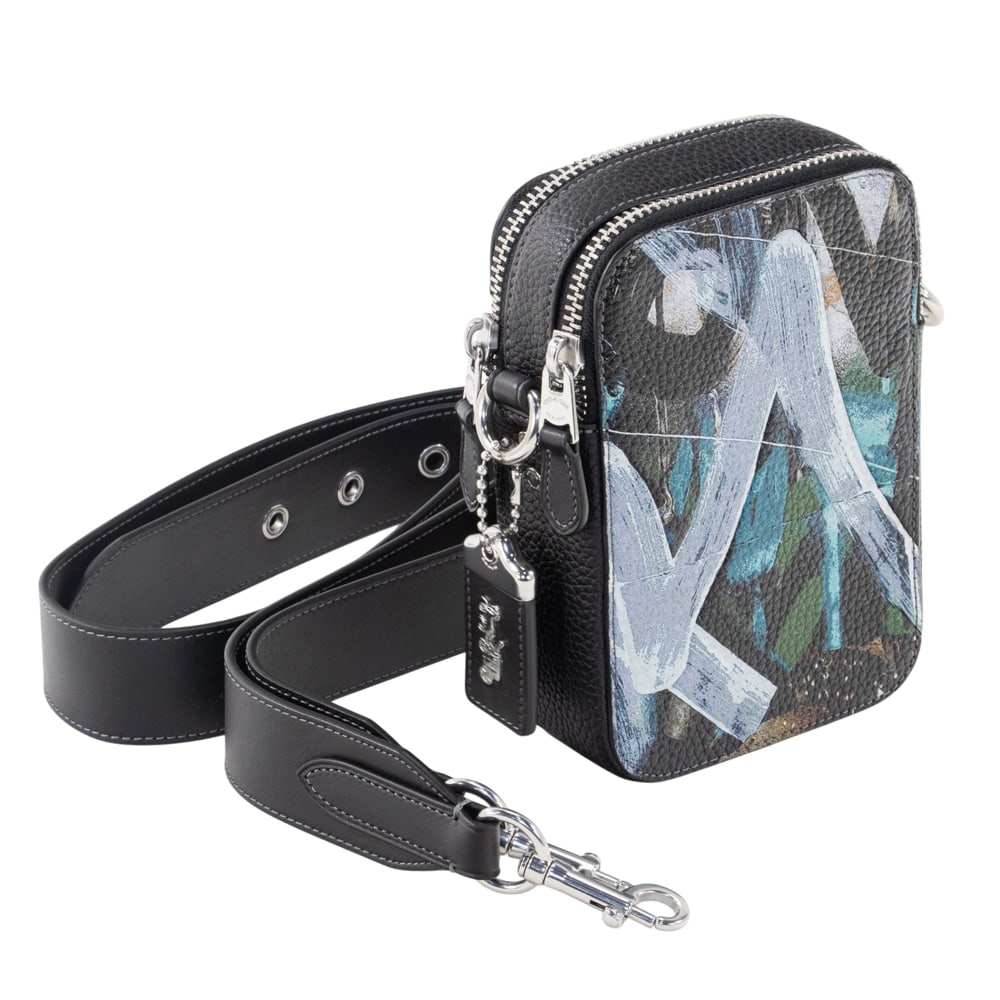 A Coach X Mint + Serf Rogue Crossbody 12 bag: A Coach X Mint + Serf Rogue Crossbody 12 bag, collaboration with graffiti artists Mikhail Sokovikov (Mint) and Jason Aaron Wall (Serf), 7.5"h x 5"w x 2.5"d