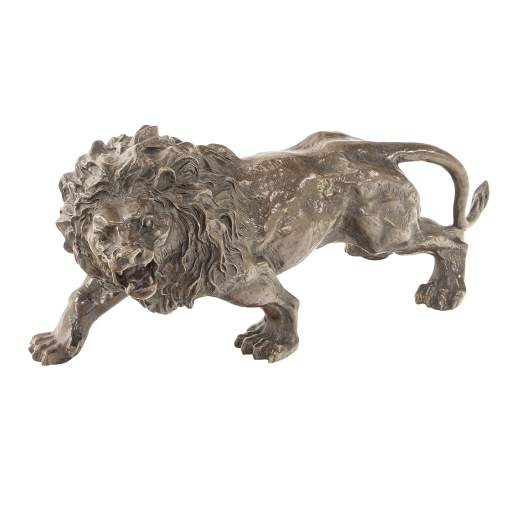 A patinated bronze figure of a lion: A patinated bronze figure of a lion, late 20th century, depicted with mouth open in a roar, unsigned, 6"h x 12"w