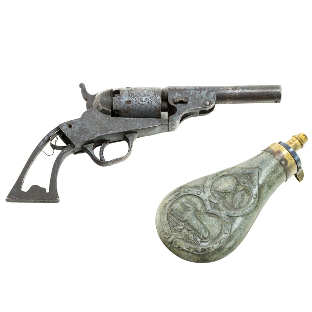 An American engraved pocket revolver and powder flask (1 of 6)