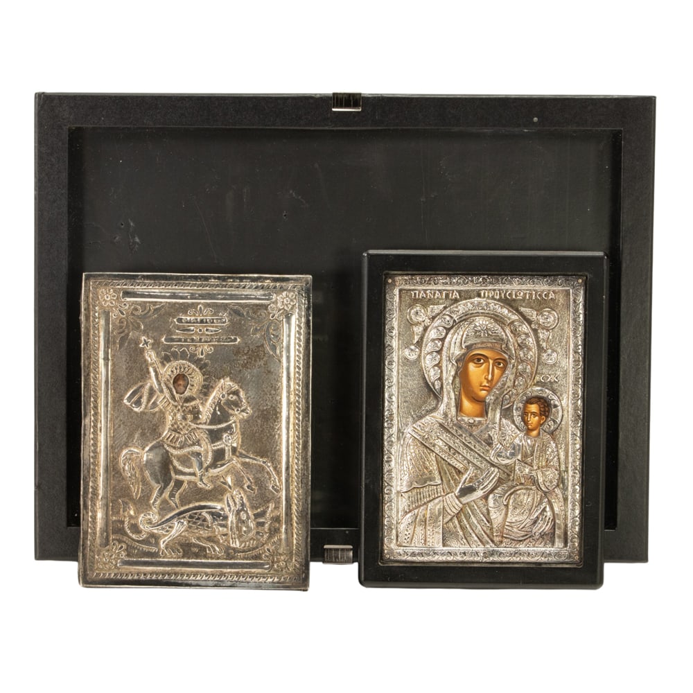 Two Greek orthodox icons with okalads: Two Greek orthodox icons with okalads, unmarked, depicting St. George and the Dragon and the Virgin Mary and Christ Child, greatest 8.25"h x 6"w