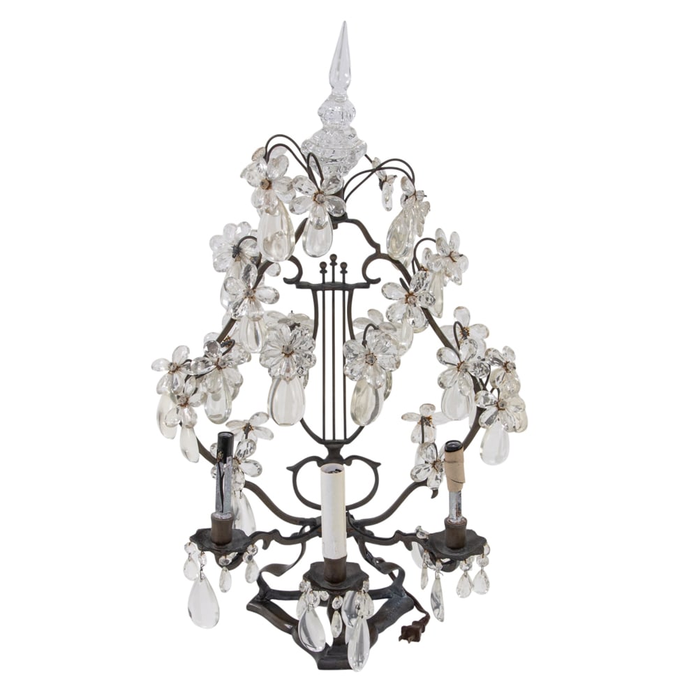 A Neoclassical style bronze and cut glass three light girandole: A Neoclassical style bronze and cut glass three light girandole, of lyre form hung all over with flower heads and prisms, 29"h x 17"w x 10"d