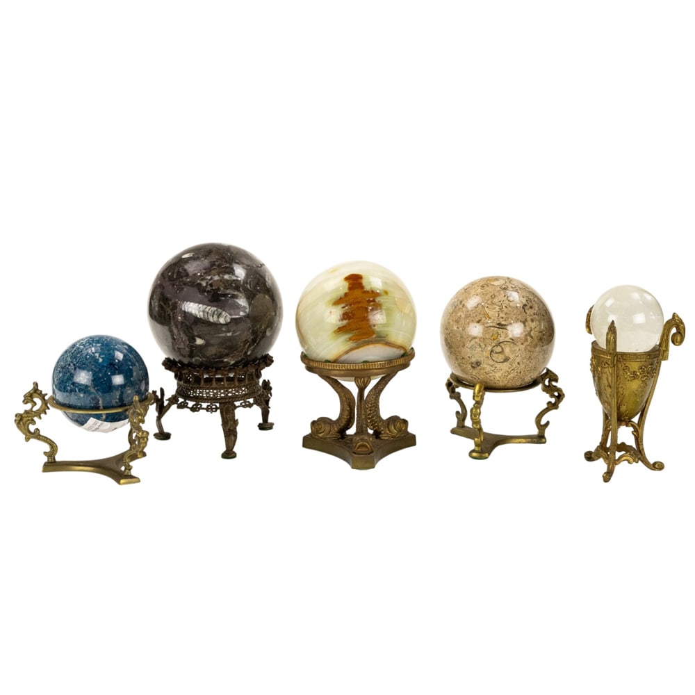 A collection of twelve stone spheres and eight pedestal stands (1 of 2)