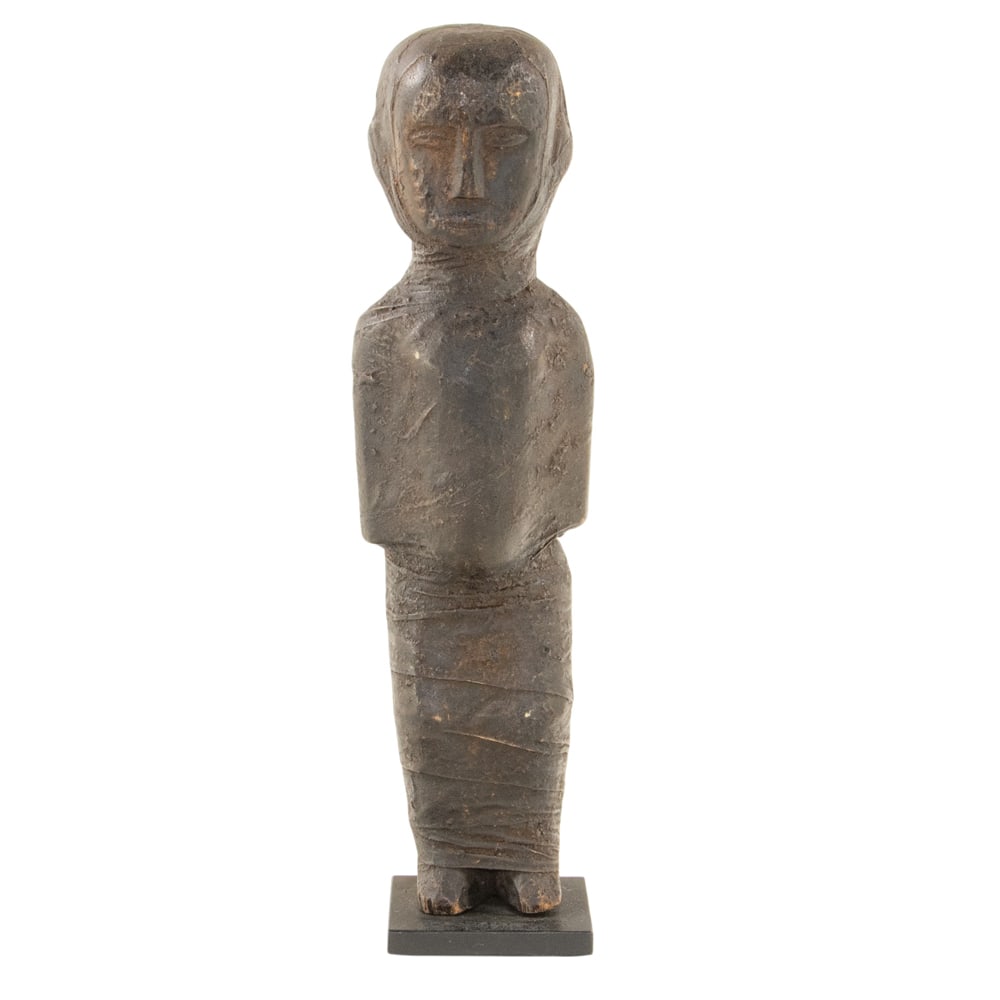 An African tribal cloth-wrapped ancestral fetish figure: An African tribal cloth-wrapped ancestral fetish figure, likely Zigua peoples, Tanzania, raised on stand, 13.5"h