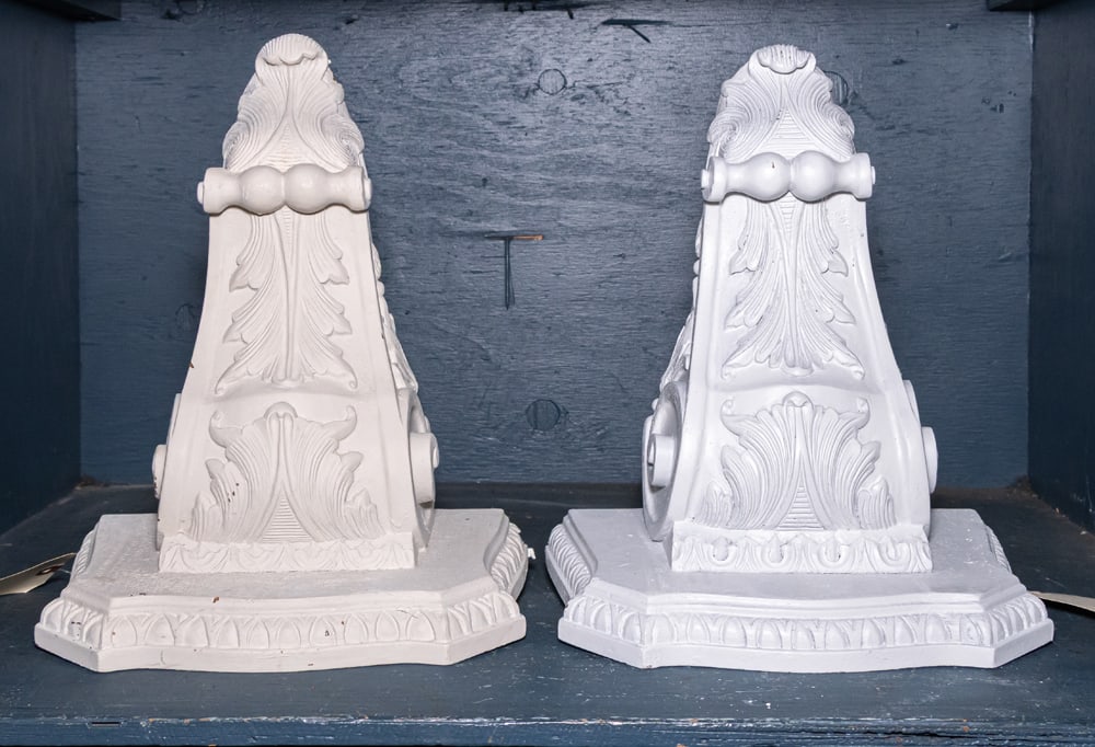 Two white painted wall brackets (1 of 1)