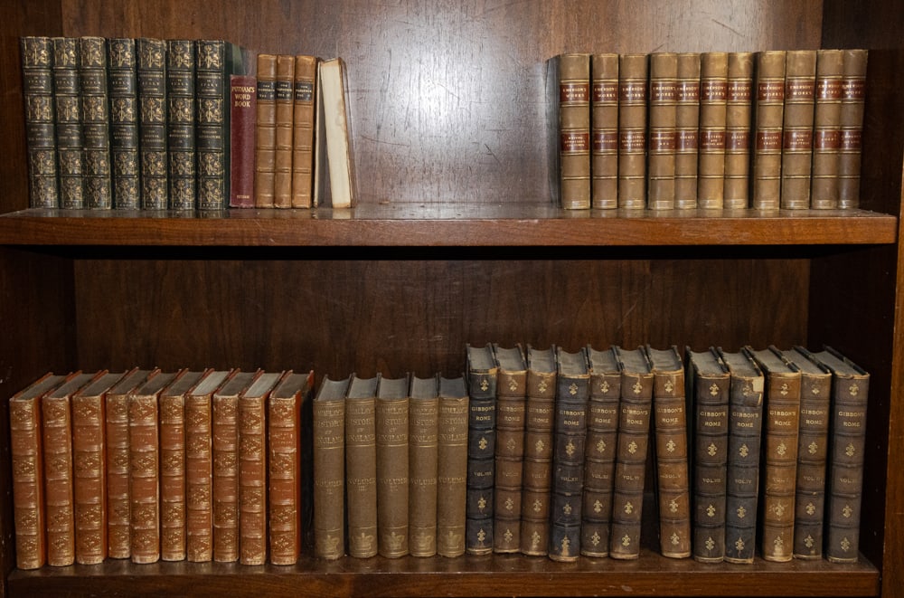 An assembled group of mainly antique hardback leather bound books: An assembled group of mainly antique hardback leather bound books, including seven volumes of Renaissance in Italy, published by Smith, Elder & Co in 1898; eleven volumes of Emerson's Complete Works, 