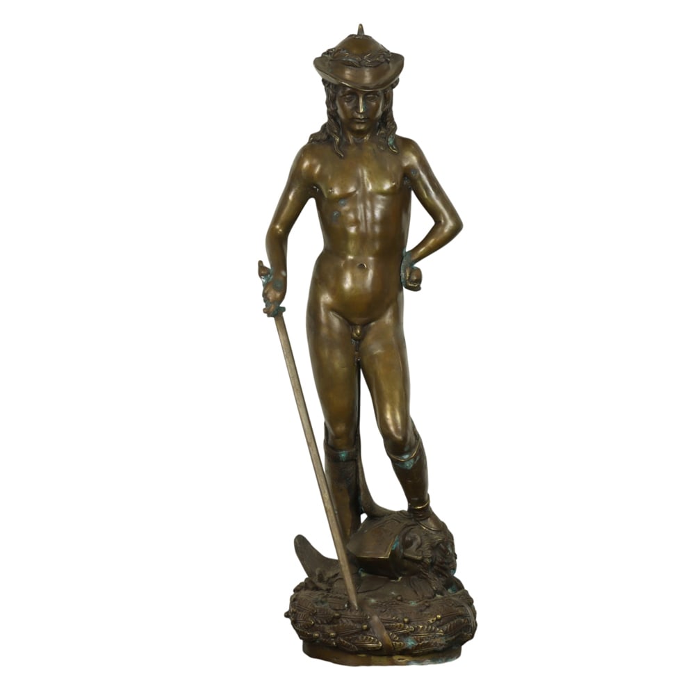 A Continental style patinated bronze figure of David after Donatello: A Continental style patinated bronze figure of David after Donatello, 31"h