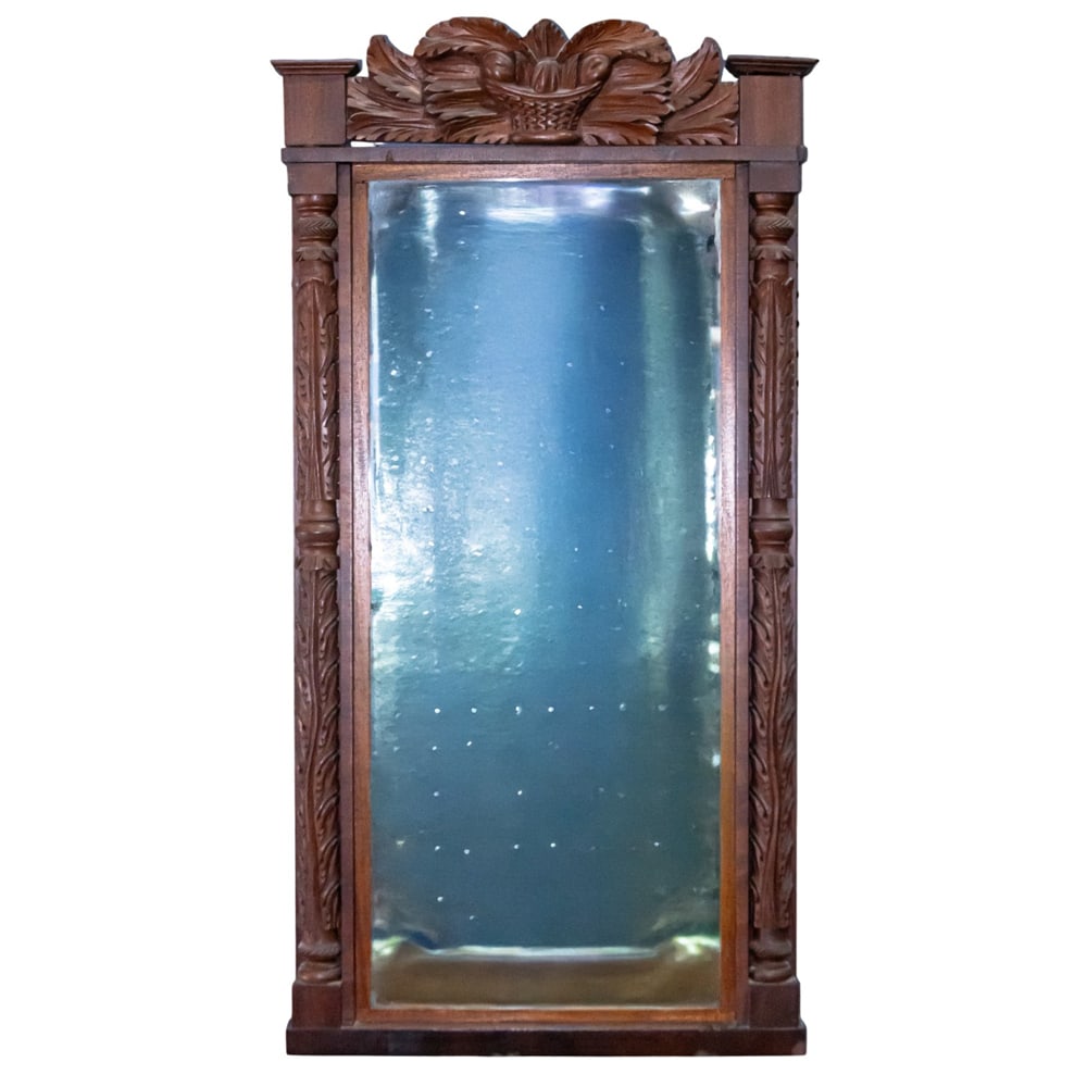 An American carved wall mirror: An American carved wall mirror, 34"h x 17.5"w. Property of a private collection, Presidio Heights, San Francisco