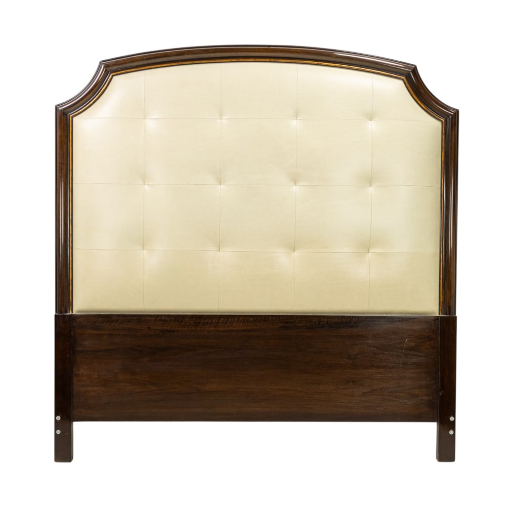 A contemporary parcel gilt wood framed leather upholstered king-size headboard (1 of 1)