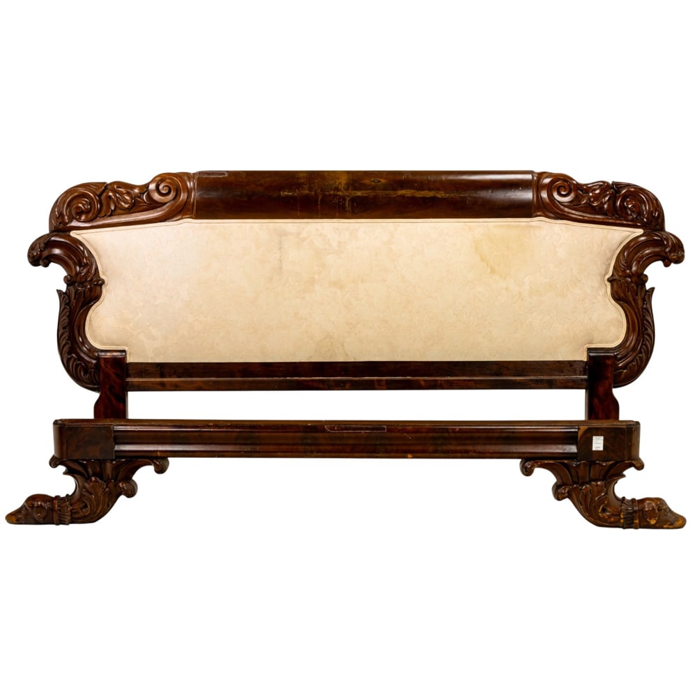 A Rococo Revival carved and upholstered headboard and footboard (1 of 1)