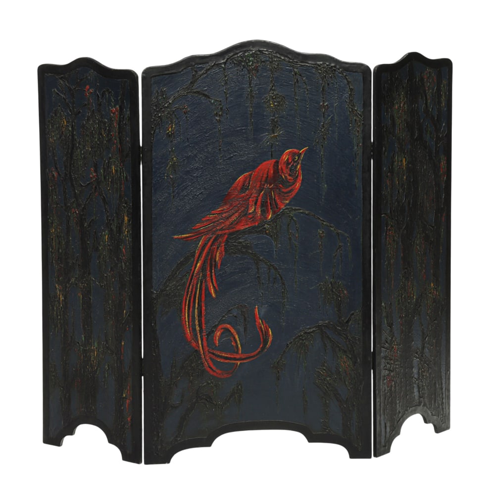 An Arts and Crafts firescreen: An Arts and Crafts firescreen, the carved and polychrome three part screen with tree and bird form reserves and an ebonized frame, 34.5"w x 38.5"w