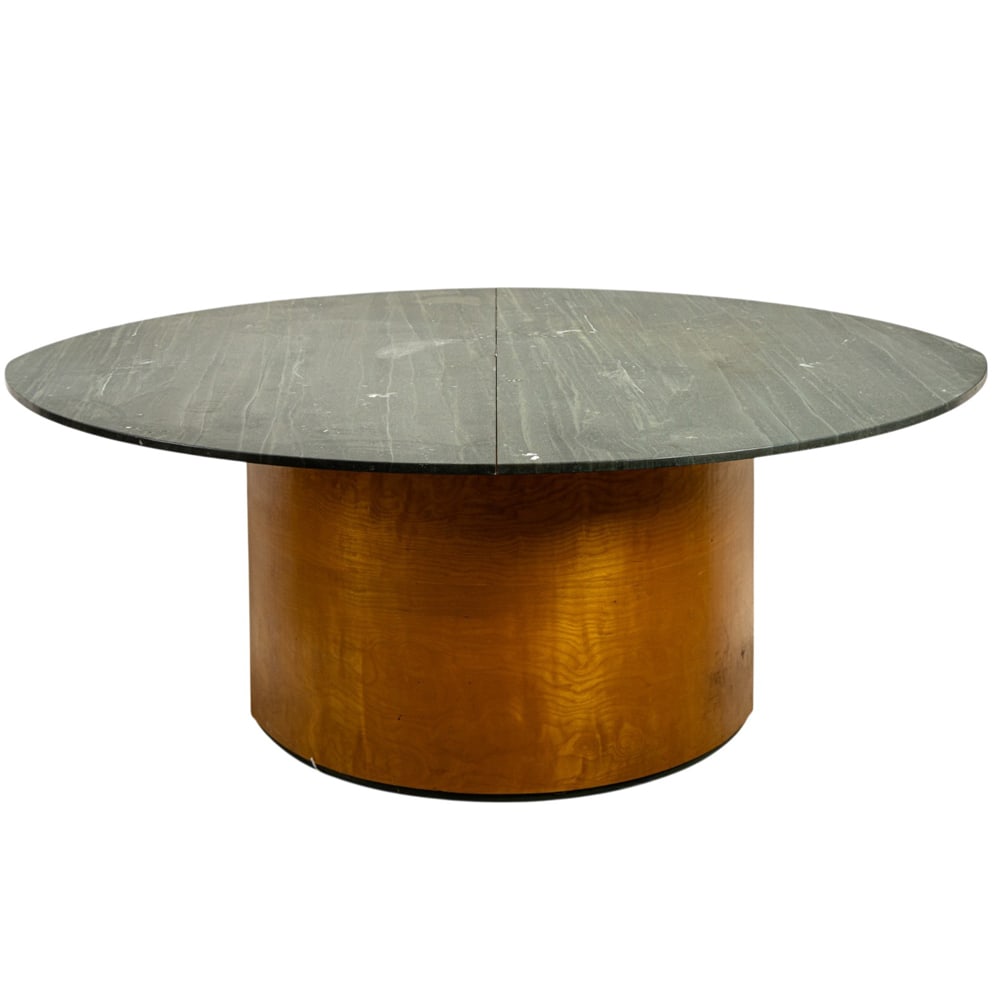 A modern elliptical pedestal table with marble top: A modern elliptical pedestal table with marble top, 30"h x 57"w x 48"d