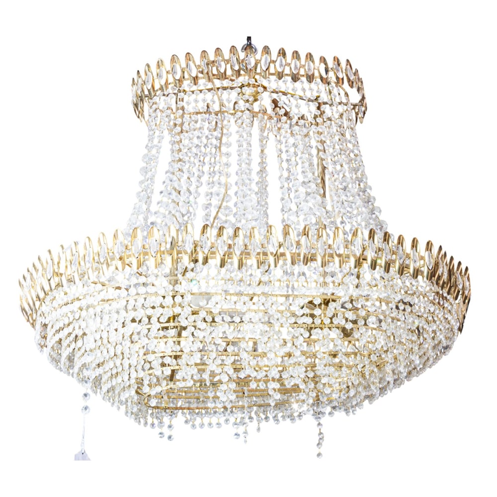 A large vintage Italian cut glass oval chandelier: A large vintage Italian cut glass oval chandelier, featuring a cascading waterfall of cut glass beads suspended from an oval frame, the interior fitted with twelve lights, 34"h x 36"w