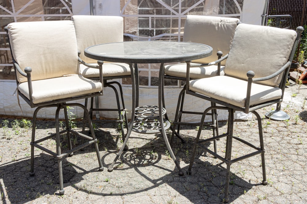 An outdoor hightop table and four bar chairs (1 of 2)