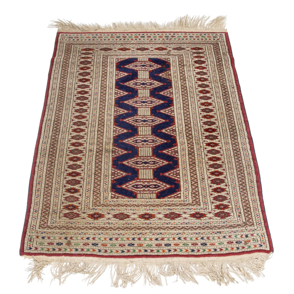 A Pakistani carpet: A Pakistani carpet, 4'4" x 3'1"