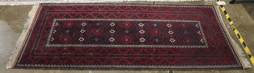 A Pakistani carpet, 3'1" x 7': A Pakistani carpet, 3'1" x 7'