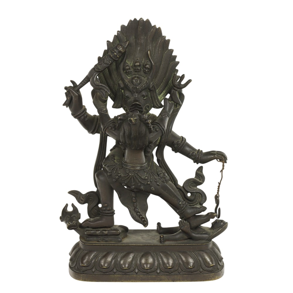 A Tibetan bronze figure of Yamabharmaraja: A Tibetan bronze figure of Yamabharmaraja. 5.5" high