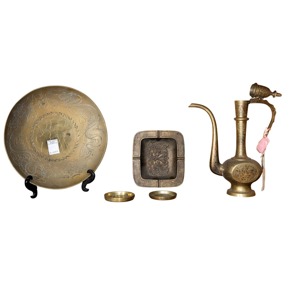 A shelf of Asian brass objects: A shelf of Asian brass objects. 20th century, 14.25" tallest.