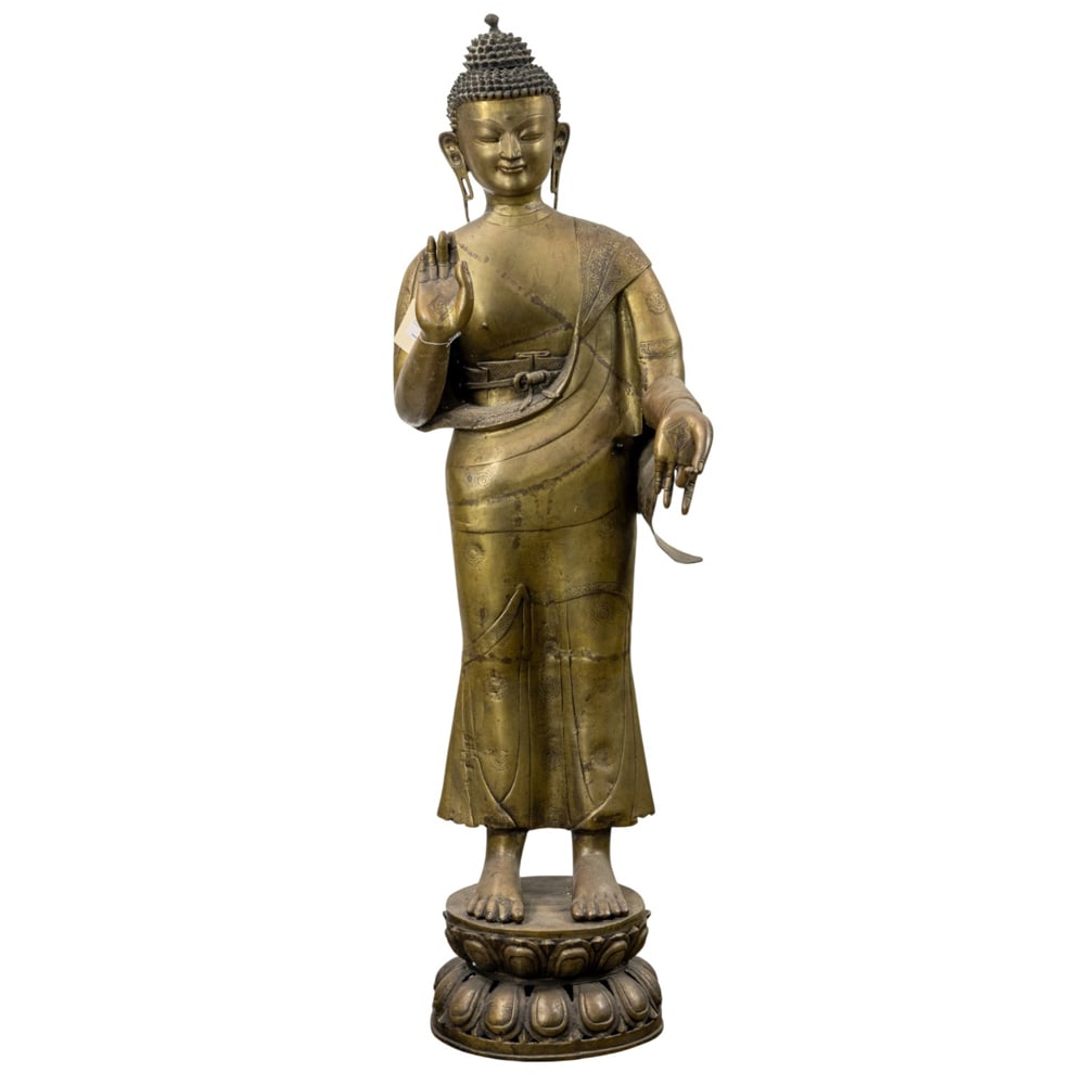 Tibetan bronze figure of Buddha: Tibetan bronze figure of Buddha. 20th century, 53.5" high.