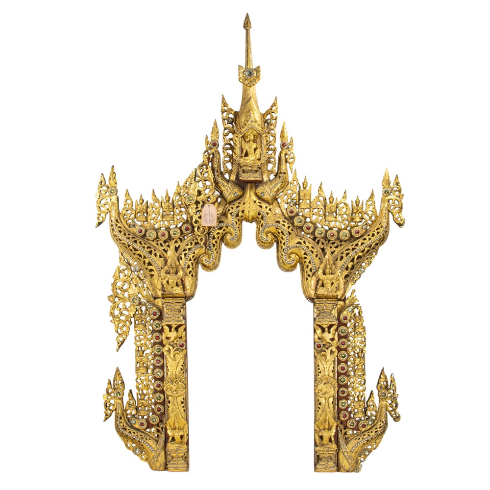 A Burmese gilt wood temple panel or altar frame: A Burmese gilt wood temple panel or altar frame. 19th century, 78.5"h x 52"w.