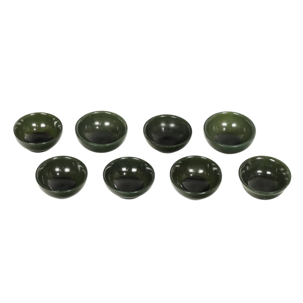 (lot of 8) Chinese spinach jade cups: (lot of 8) Chinese spinach jade cups. 2" across.